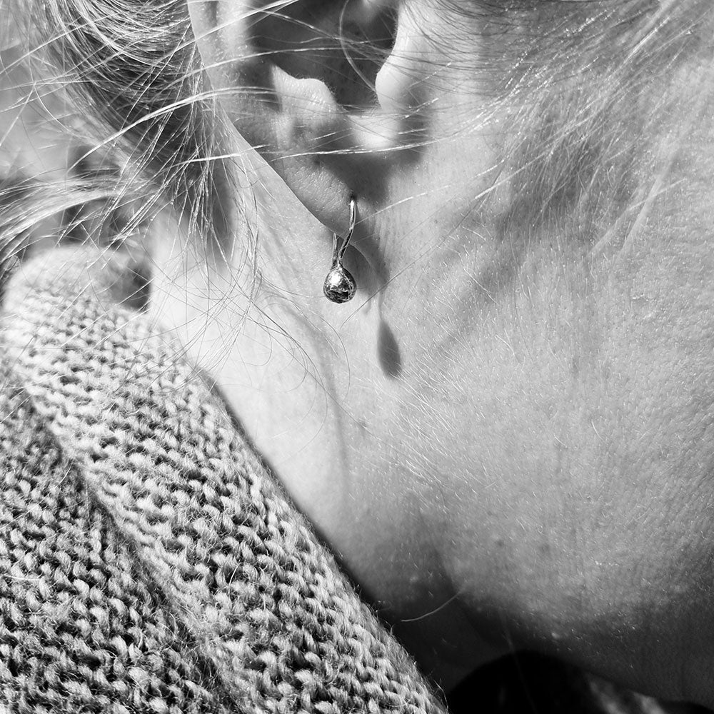 TILIA Frö earring on hook in 925 sterling silver with a tiny seed shaped drop