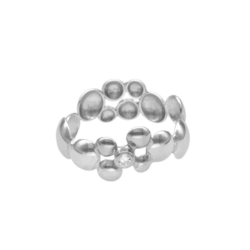 CELEBRATE Scarfring in polished silver with bubble shaped beads on a white background