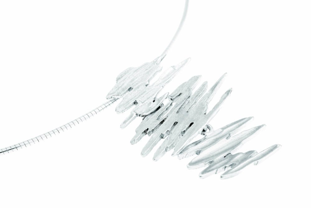 ALANDICA pendant with stacked irregular silver shards on a slim chain