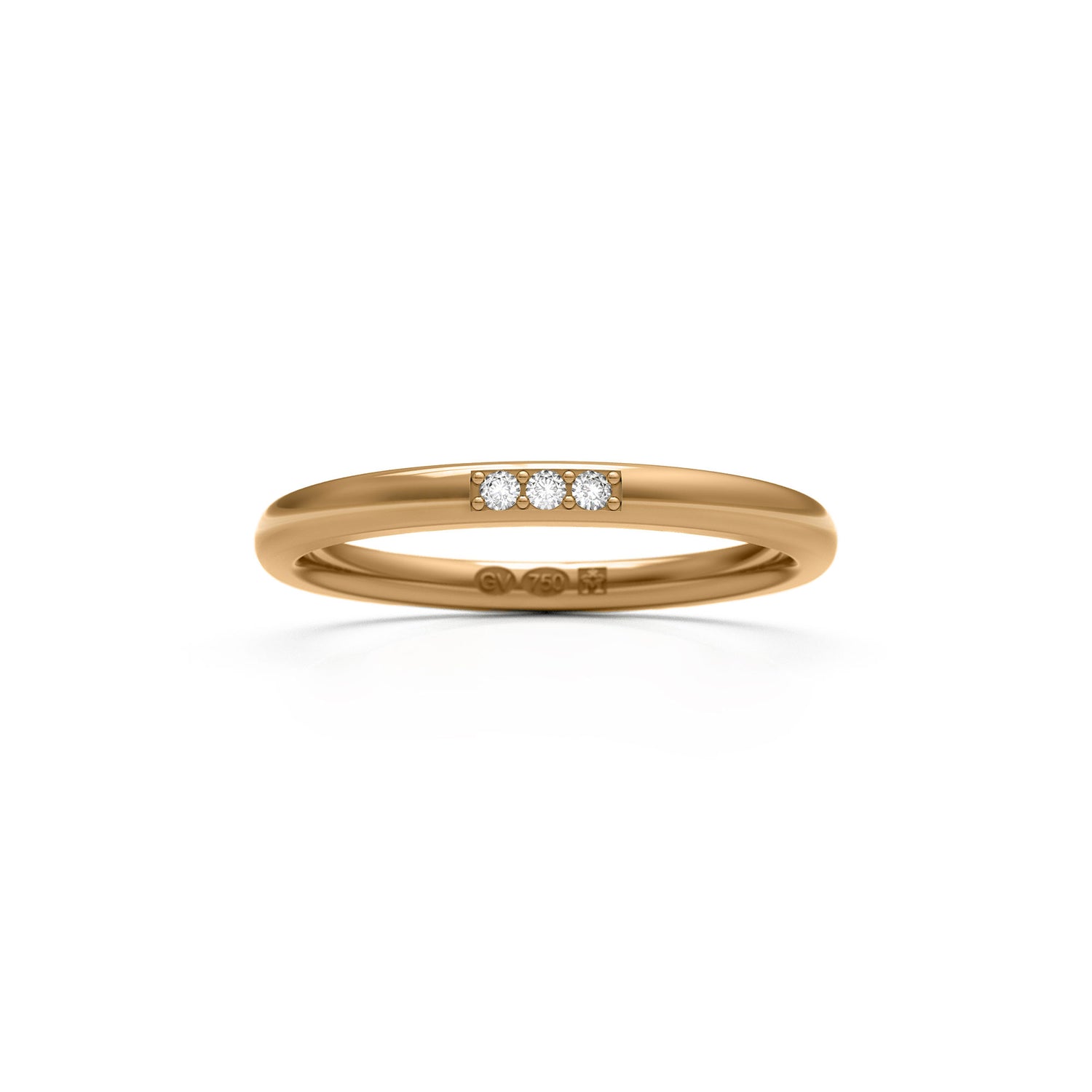 18k gold ring with three diamonds set in a row