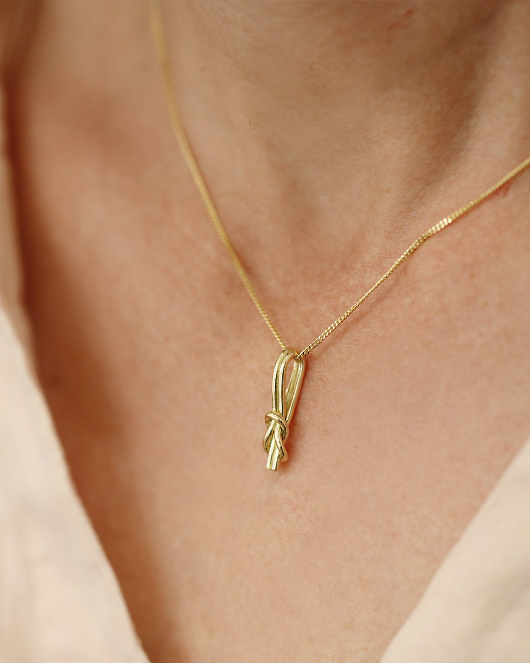 RÅBANDSKNOP (Reef Knot) 18K necklace