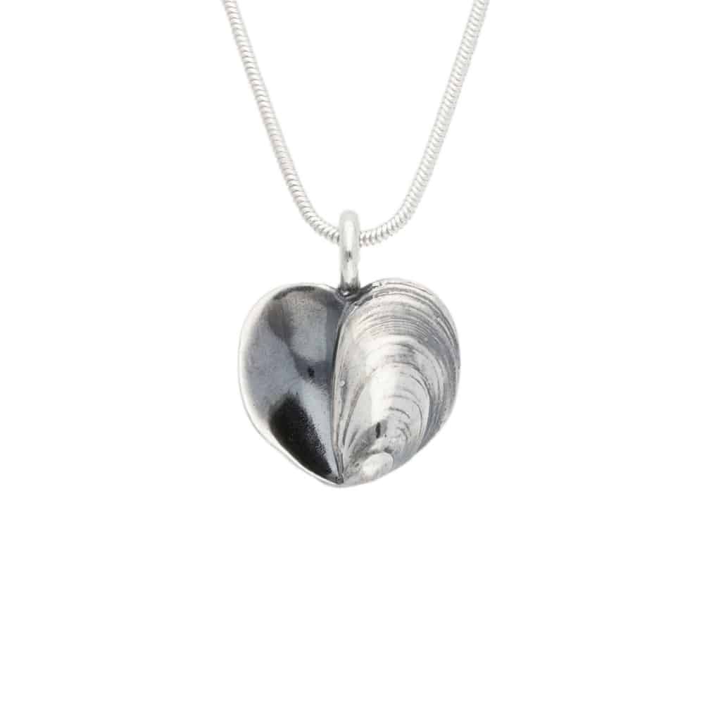 Silver two tone heart shaped pendant with shell motif on a snake chain necklace