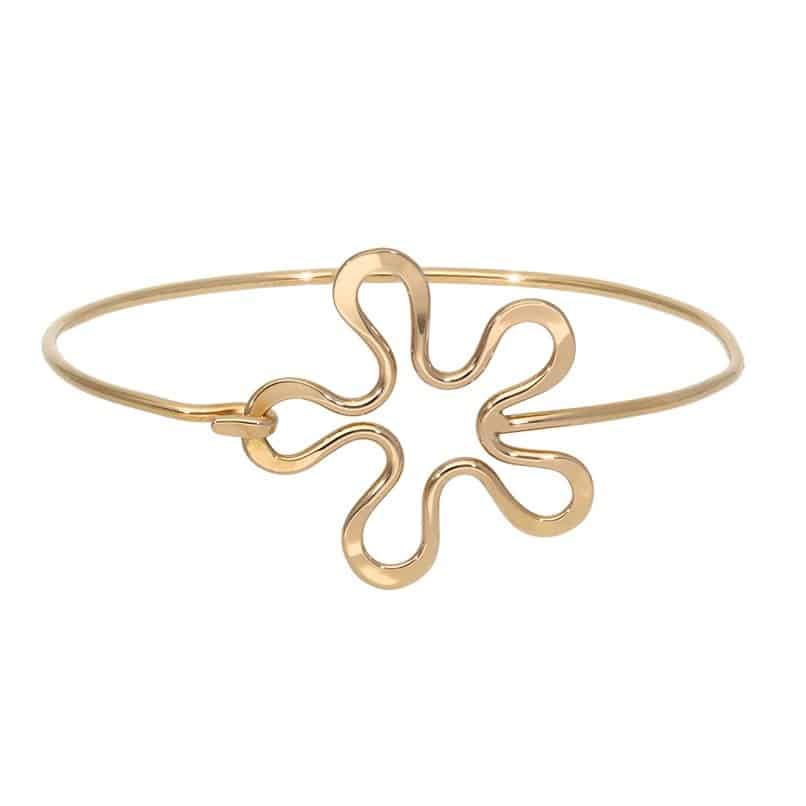 BLOMMAN 18K armring with a flower shaped centerpiece in polished gold