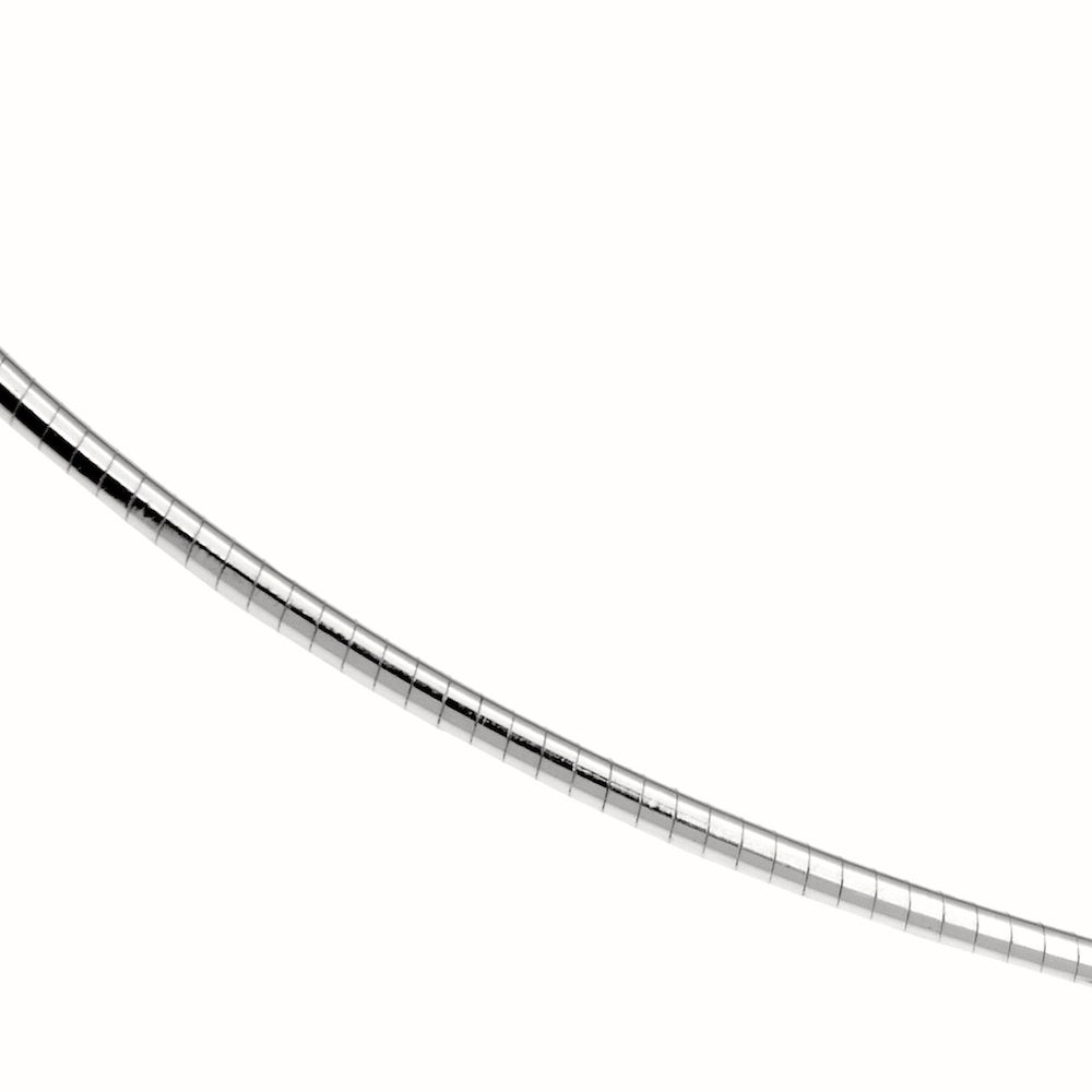 Close-up of a silver omega chain with polished rounded links