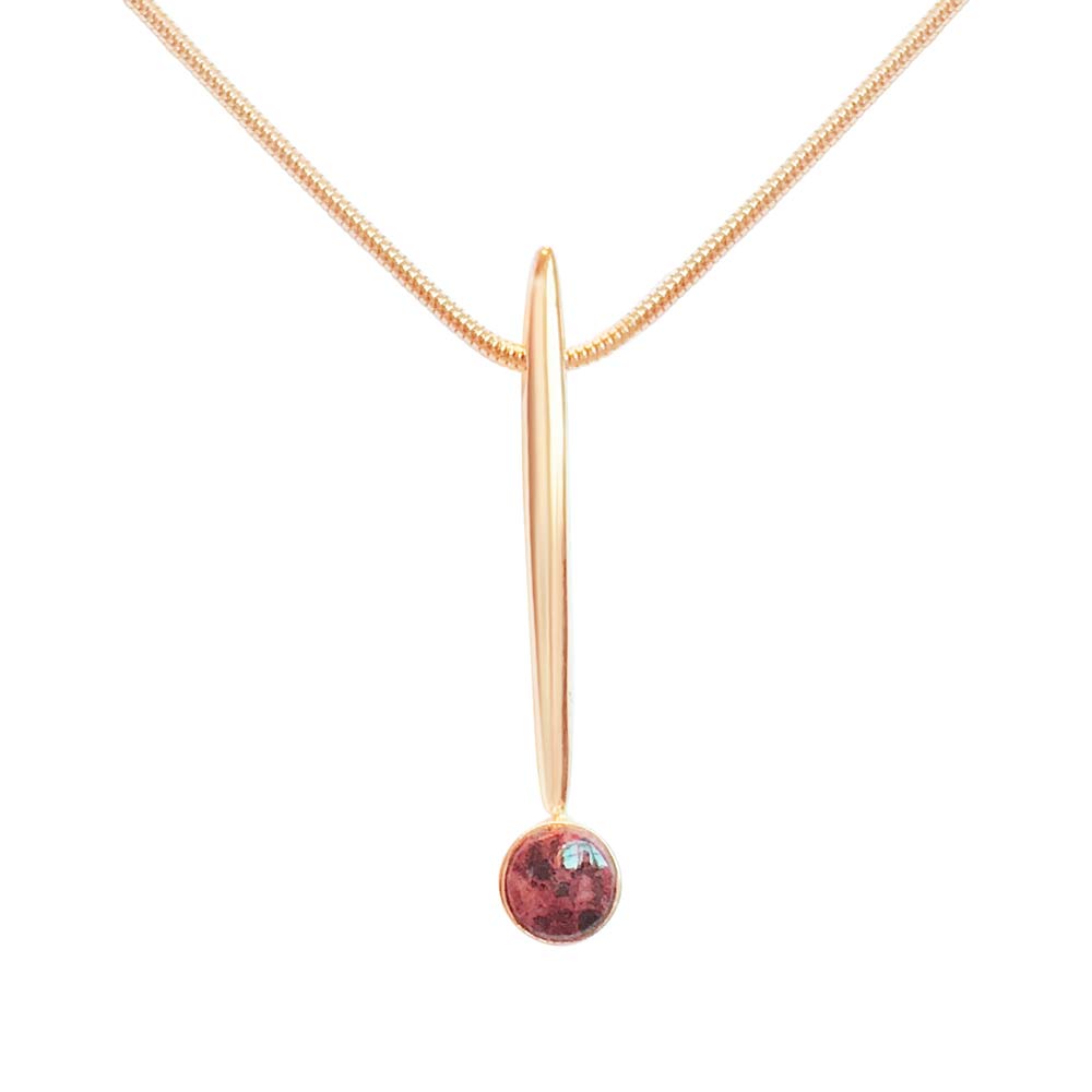 Rose gold bar pendant with a round red granite bead on a delicate chain