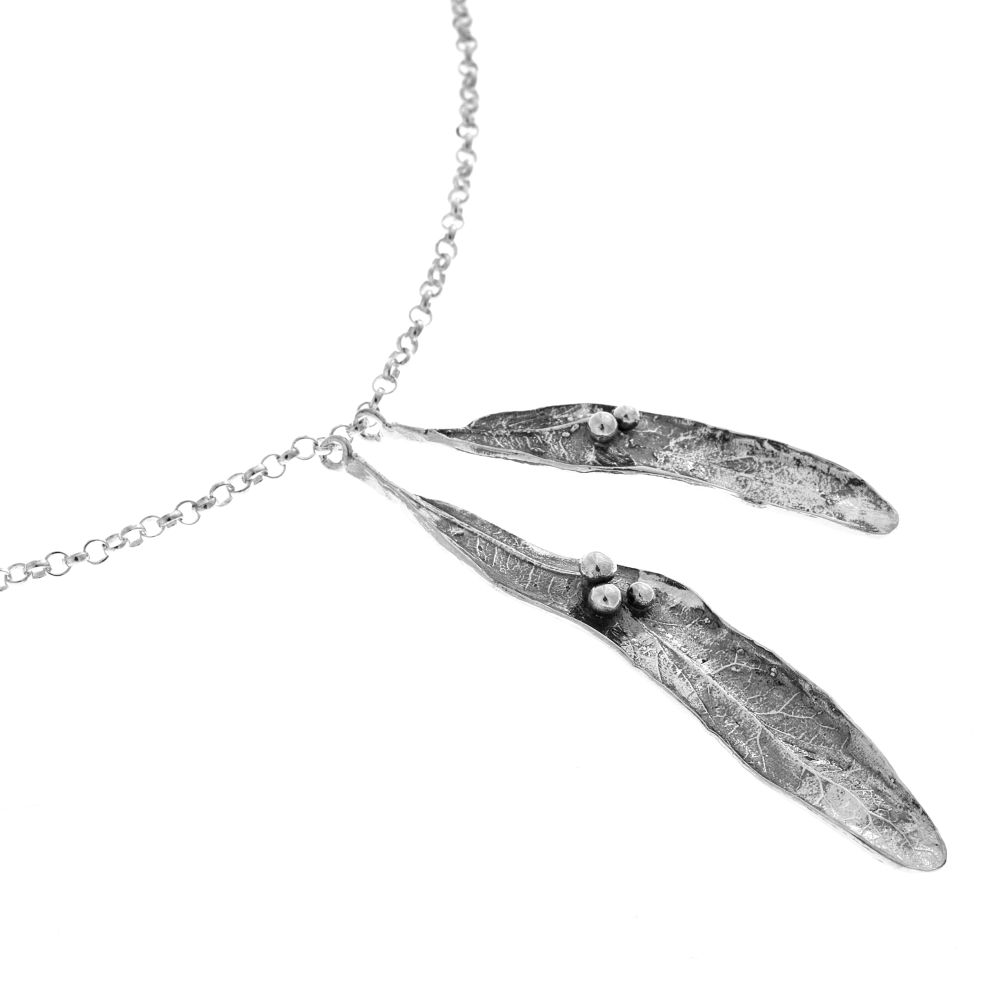 Tilia necklace with two elongated leaf pendants on a silver chain