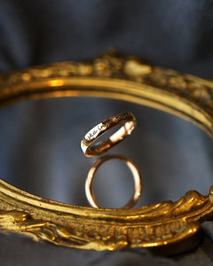 Stormskärs Maja ring in 18K recycled gold with a 4 mm band and engraved inspirational phrase