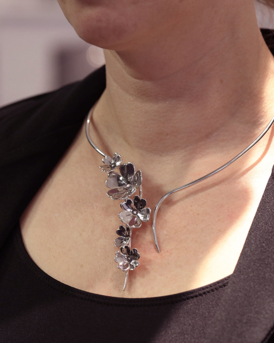 GULLVIVA collier in sterling silver with a cascading cluster of flowers worn on the neck