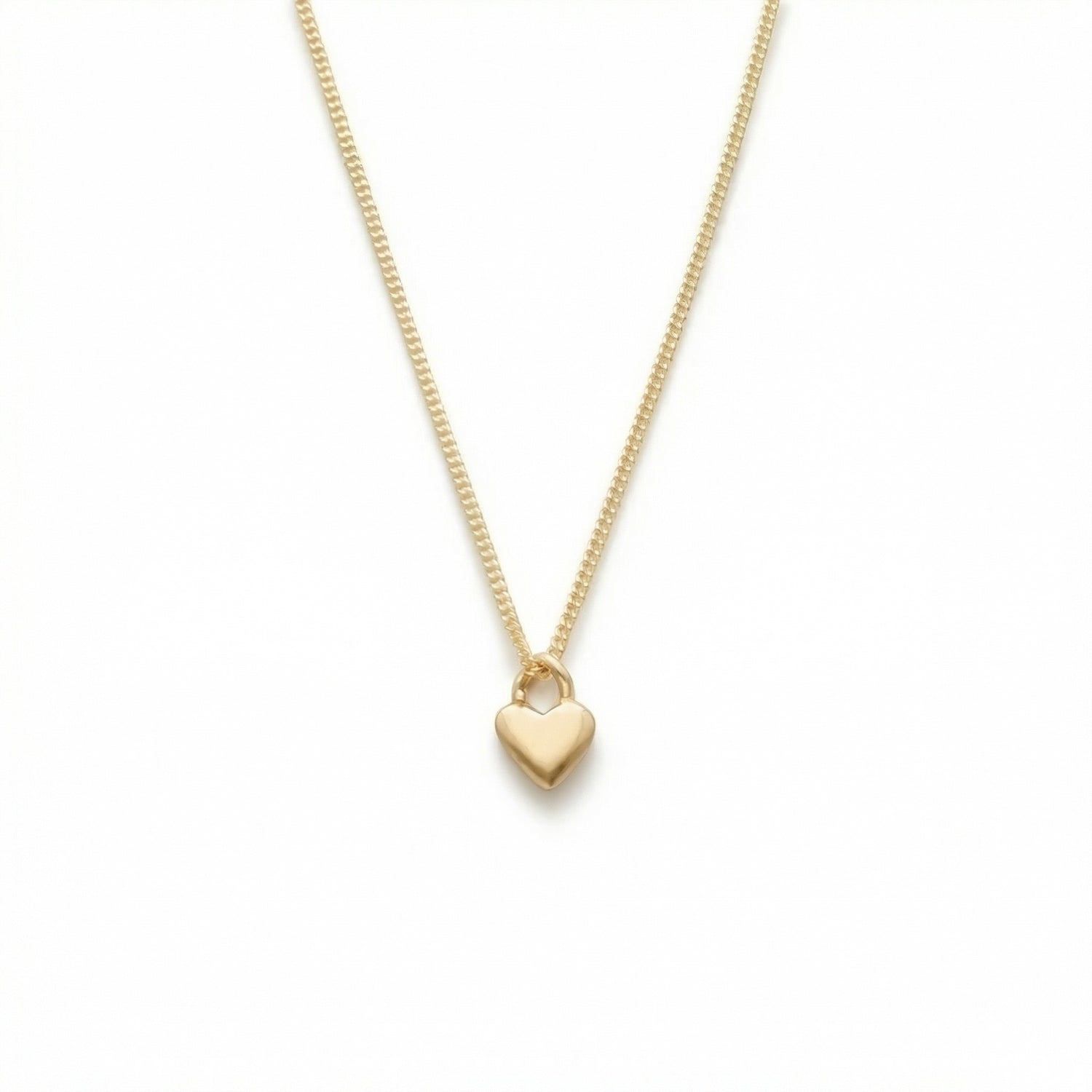 18K guld halsband med ett hjärta hänge där kedjan går genom en vriden ögla