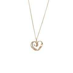 Närbild av ett 18K guld pansarkedja halsband utan hänge mot vit bakgrund