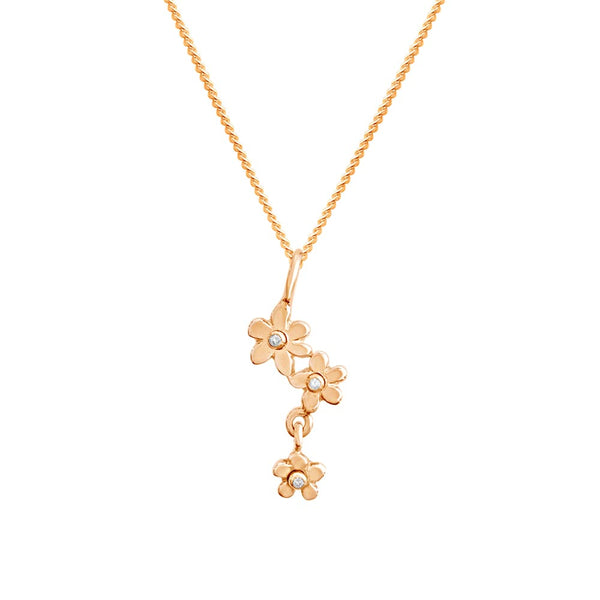 18K gold necklace with a cascading pendant of three forget me not flowers, each with a diamond center.