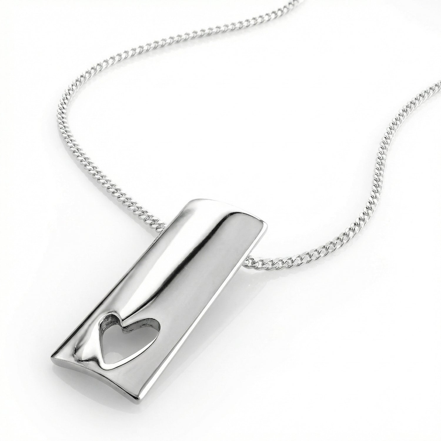 Close-up of a silver HEART necklace chain on a white background