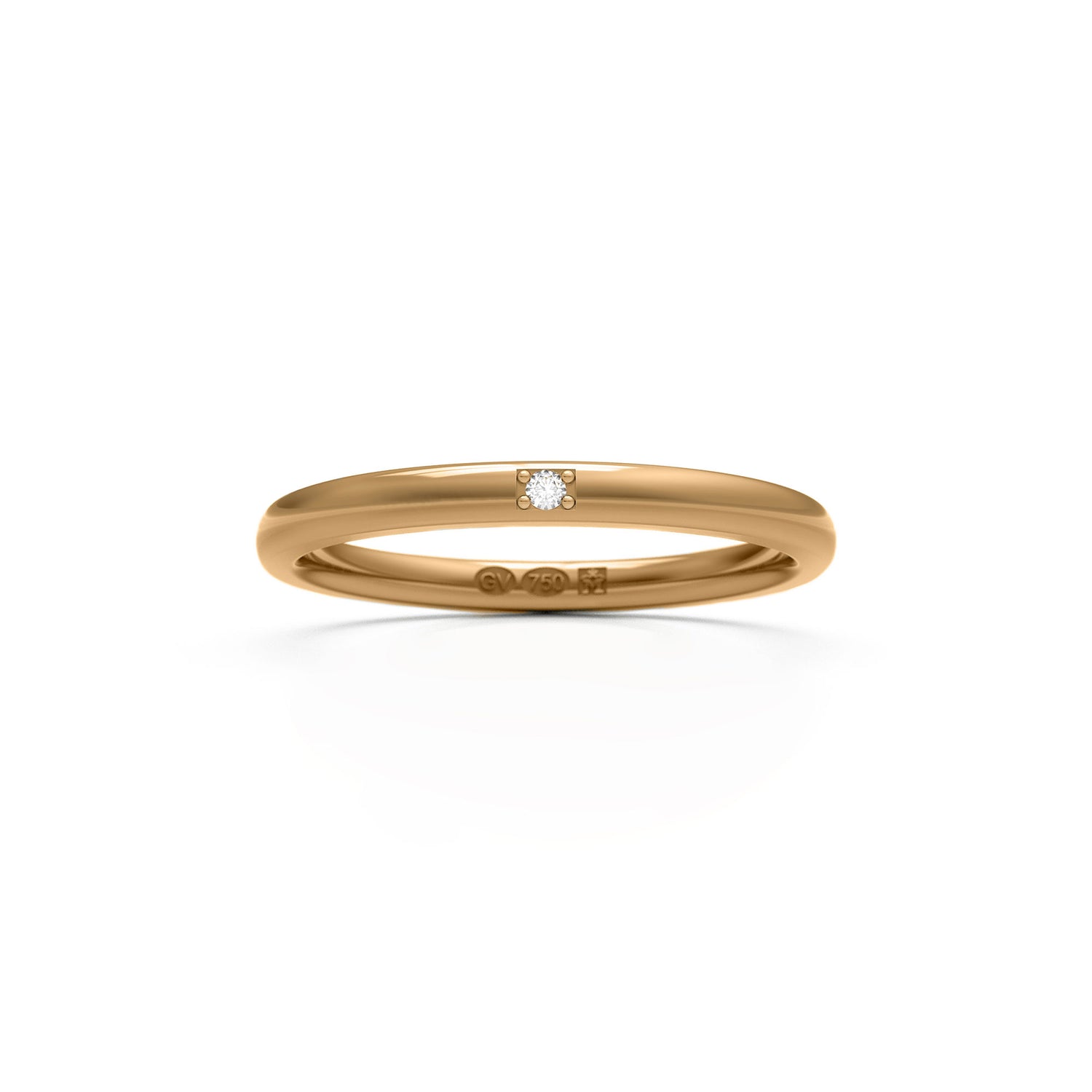 18k gold ring with a single diamond in a square four-prong setting