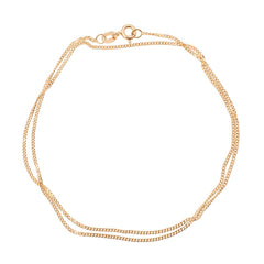 Close-up of a rose gold 18K pansarkedja chain necklace on a white background.