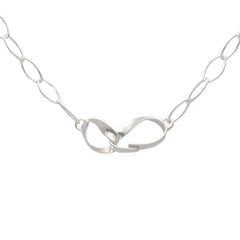 Sterling silver STORMSKÄRS MAJA NÄT necklace with interlocking loop centerpiece and elongated oval chain links.