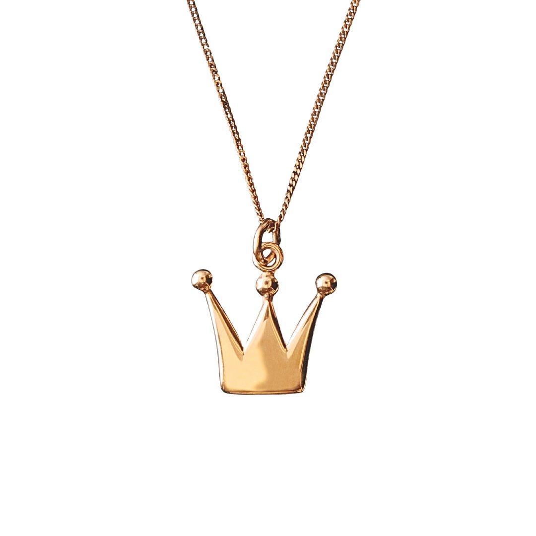 Halsband i 18K guld med prinsesskrona hänge på pansarkedja