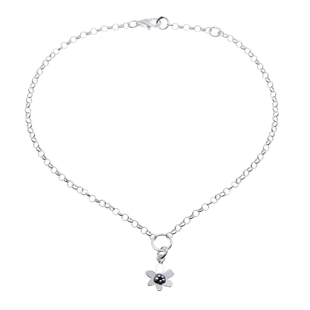 Flat view of a 925 sterling silver anklet with a small flower charm and secure clasp