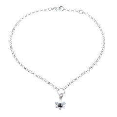 Flat view of a 925 sterling silver anklet with a small flower charm and secure clasp
