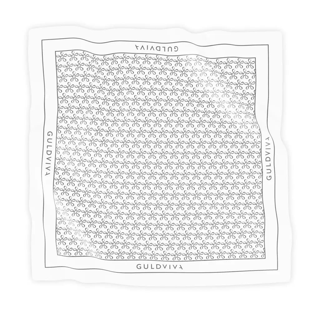 BLOMMAN scarf design with a repeating floral motif on white fabric.