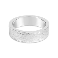 Björk ring in 925 sterling silver with a hammered textured band about 5 mm wide