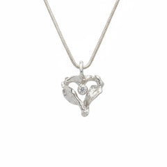 Silver heart shaped pendant with a central cubic zirconia gem