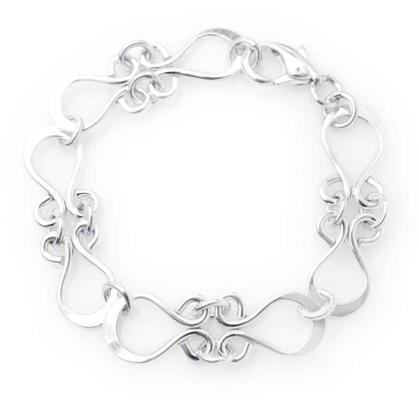 FOLKLORE armband in sterling silver with flowing interlocking links forming a decorative circular bracelet