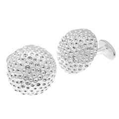 Sterling silver golf ball cufflinks with a textured dimpled surface.