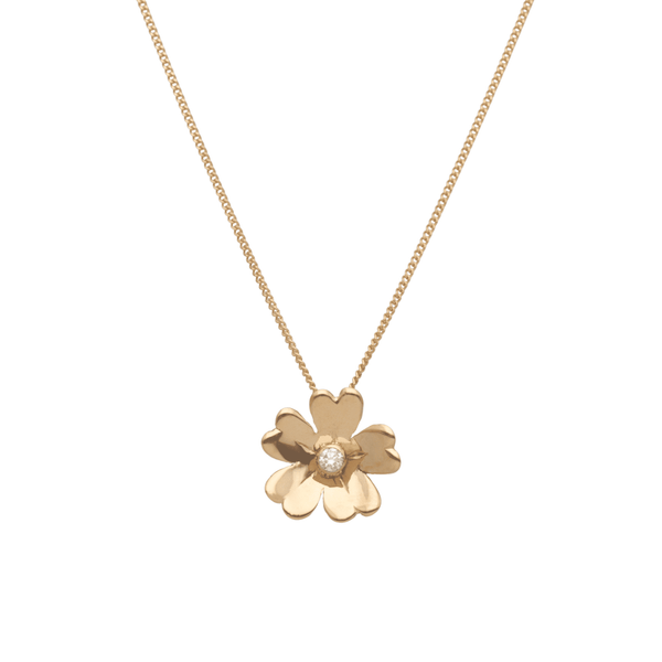 18K guld halsband med gullviva blomformad hänge och diamant i mitten