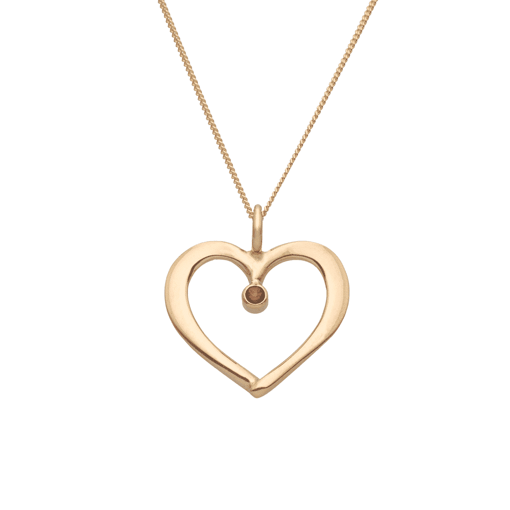 18K guld halsband med hjärthänge och granat från Lappland