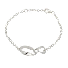 Silver STORMSKÄRS MAJA bracelet with an oval chain and a curved bow centerpiece