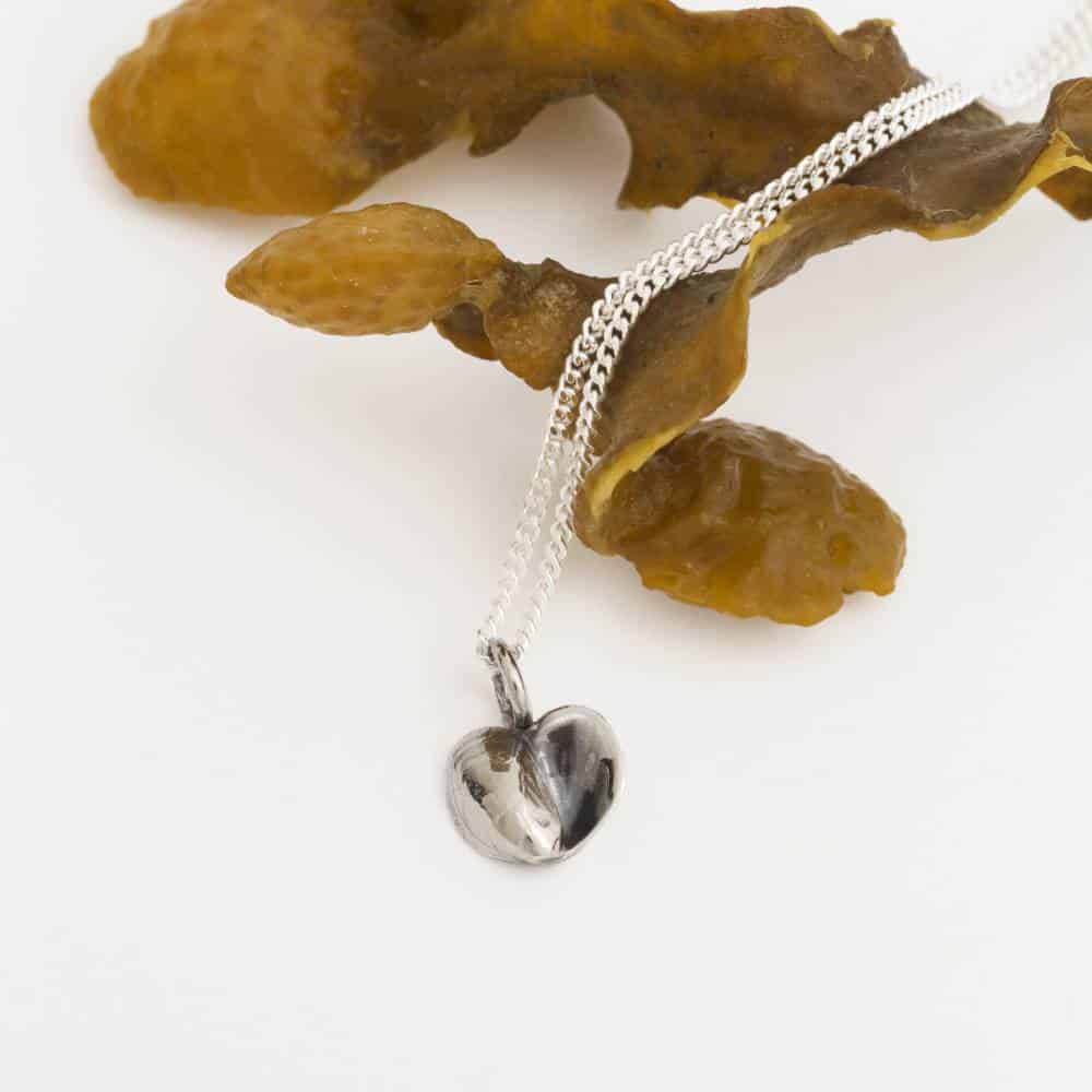Antique finish silver heart pendant on a slender chain necklace